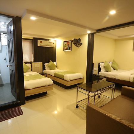Hotel Happyland Bombaim Quarto foto