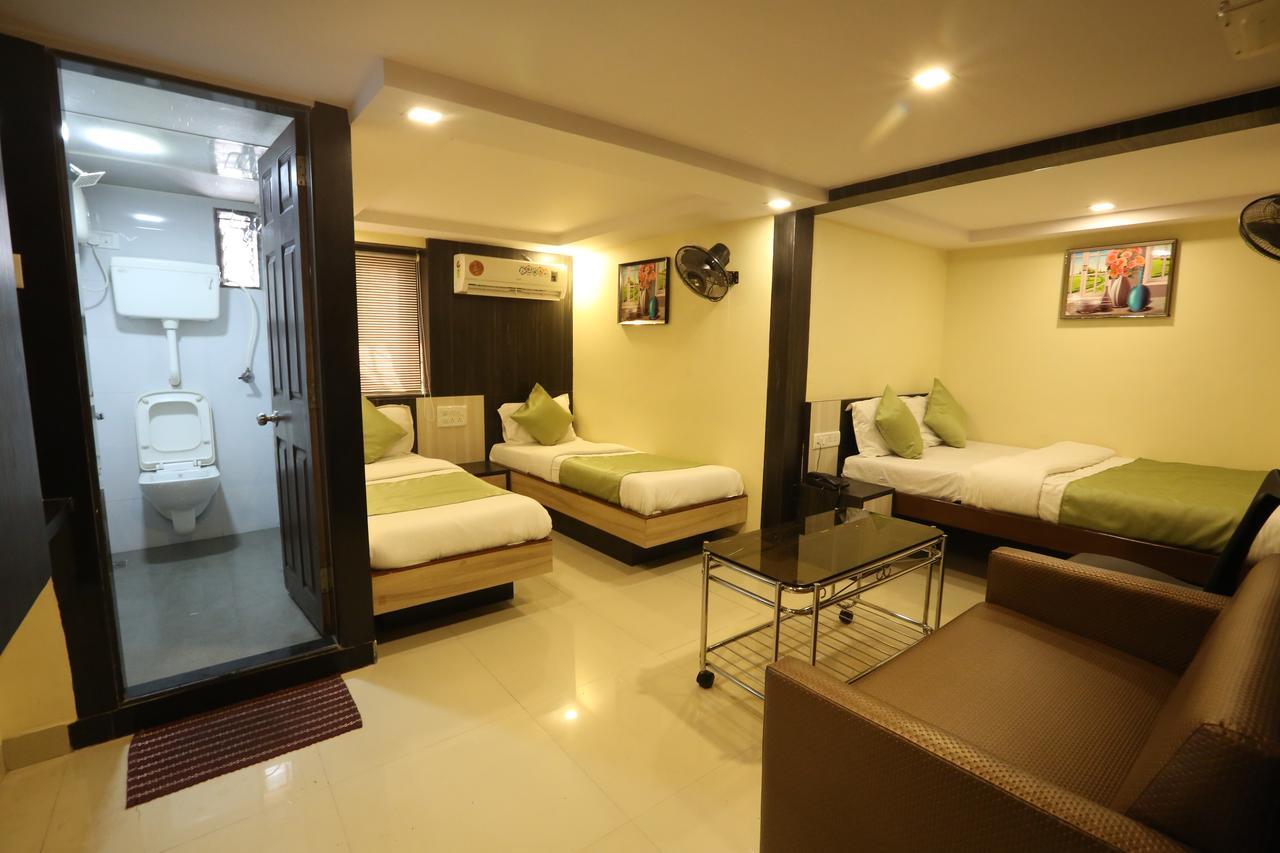 Hotel Happyland Bombaim Quarto foto