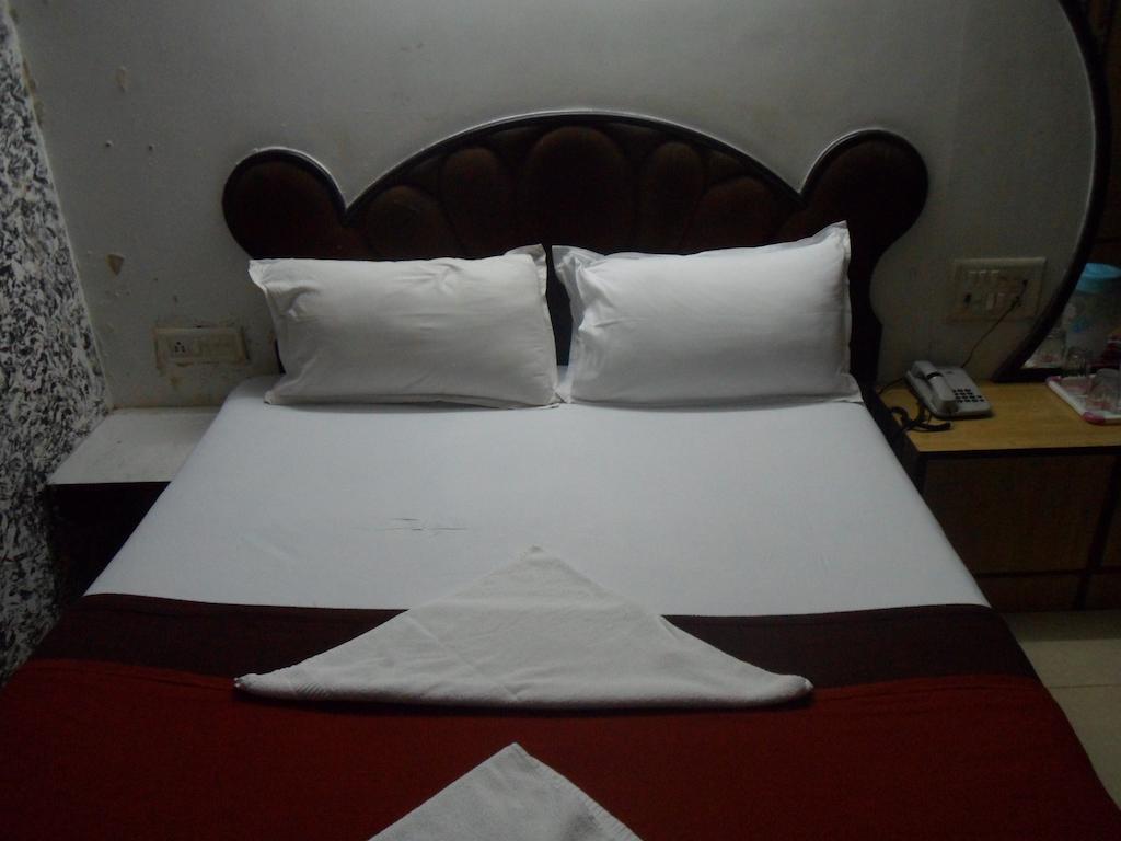 Hotel Happyland Bombaim Quarto foto